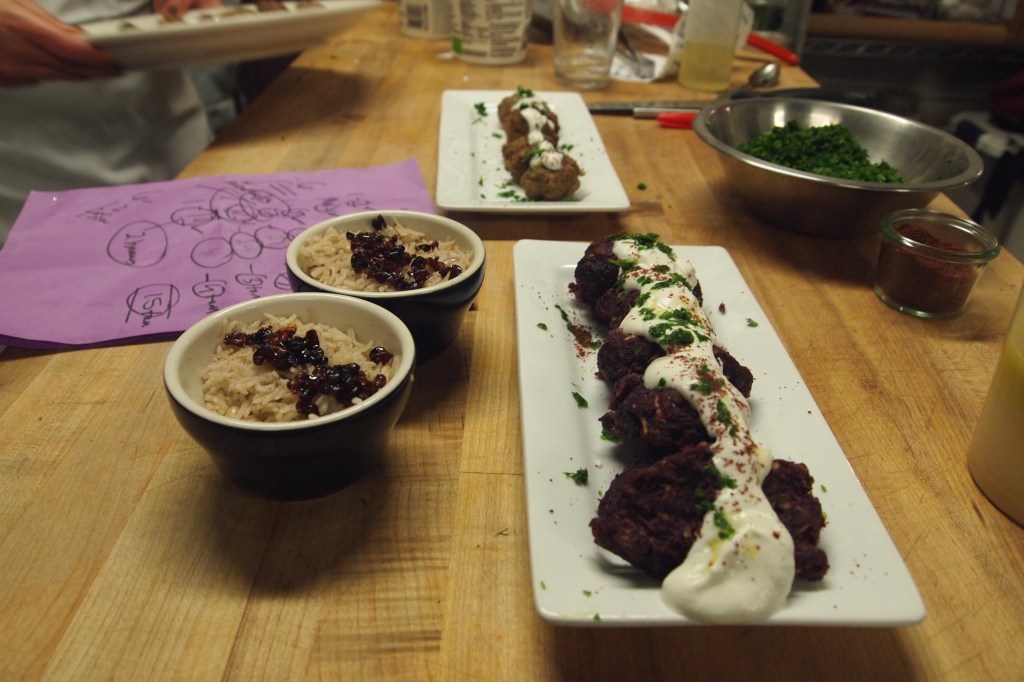The meatballs are topped with sumac spice and are brushed with tahini as they are baked. Barberries are an Iranian delicacy. 