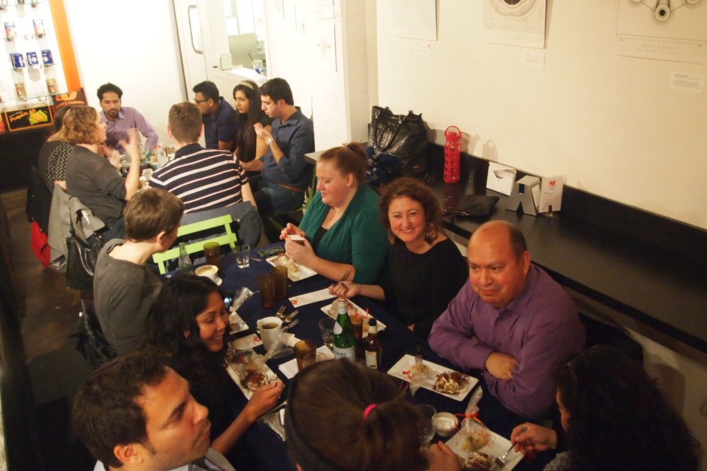 A big table was filled with friends from Seattle. 