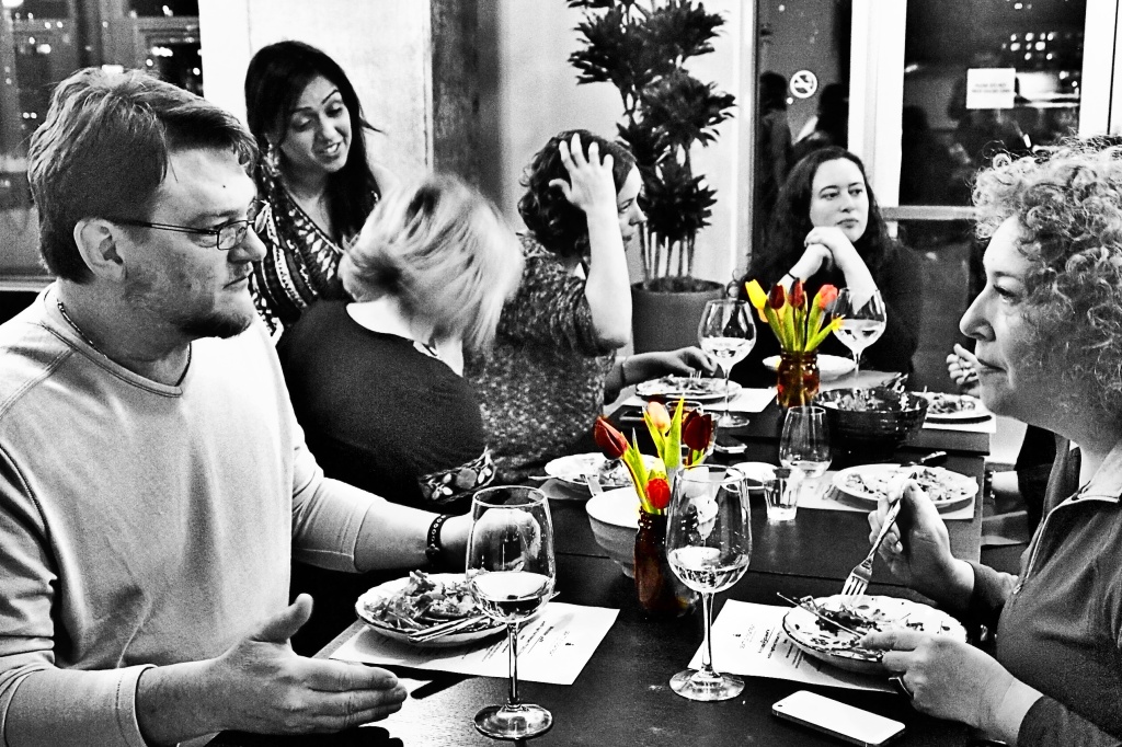 Our wonderful participants (and friends) conversing during the appetizers. The tulips are from Pike Place Market!
