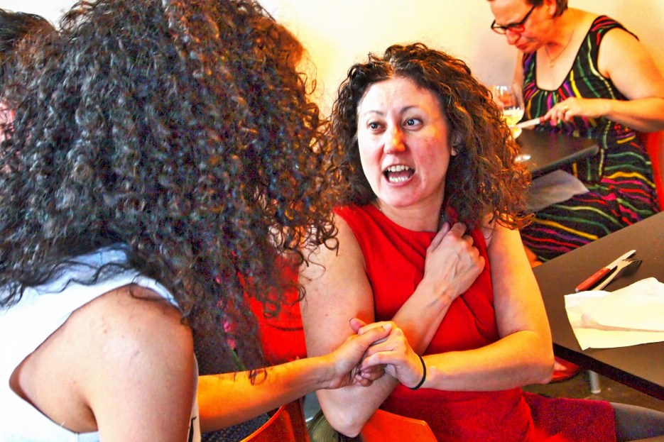 Friends catching up in between bites!